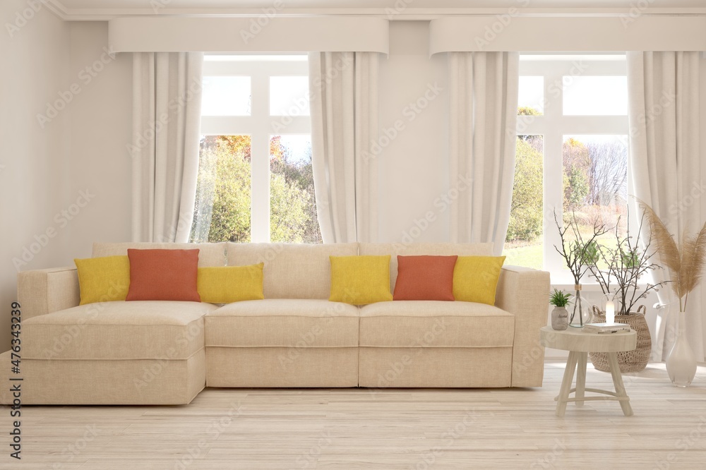Stylish room in white color with sofa and autumn landscape in window. Scandinavian interior design. 3D illustration Stylish room in white color with sofa and autumn landscape in window. Scandinavian interior design. 3D illustration
