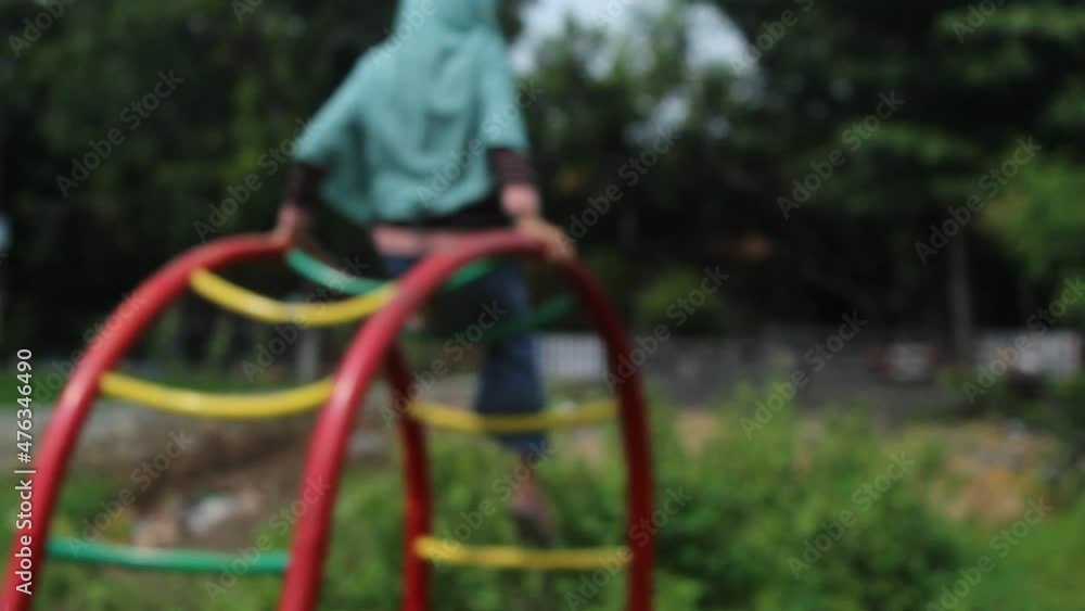 child playing in the playground child playing in the playground