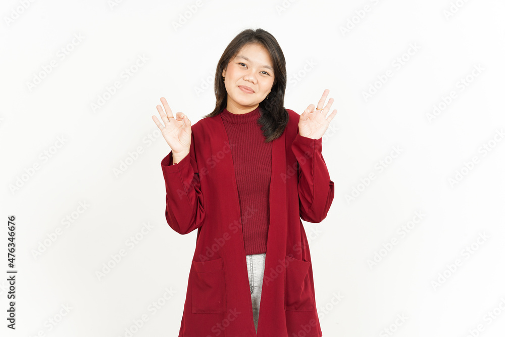 Showing Ok Sign Of Beautiful Asian Woman Wearing Red Shirt Isolated On White Background Showing Ok Sign Of Beautiful Asian Woman Wearing Red Shirt Isolated On White Background