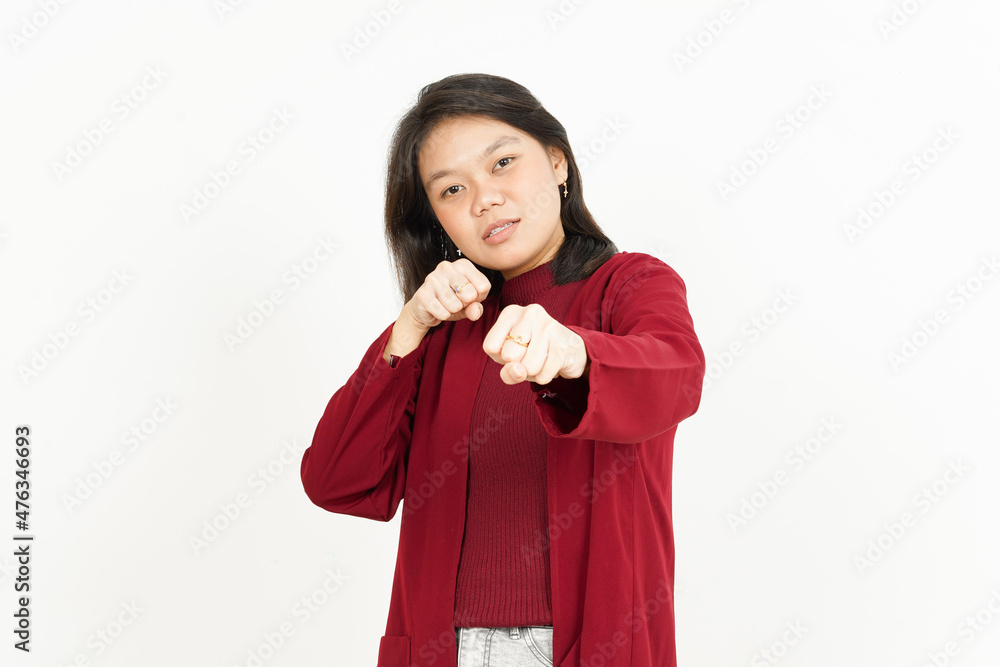 Making punch fist Of Beautiful Asian Woman Wearing Red Shirt Isolated On White Background Making punch fist Of Beautiful Asian Woman Wearing Red Shirt Isolated On White Background