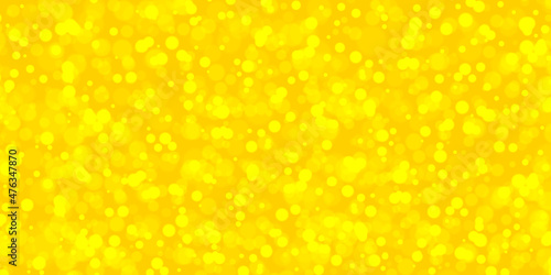 Abstract beautiful and colorful light glowing and blurry yellow bokeh background with space for your text.colorful yellow bokeh for wallpaper,cover,card,celebration,decoration and design.