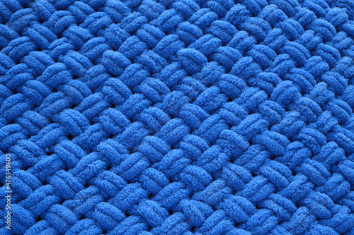 Background knitted blanket, handmade, close up of blue color.