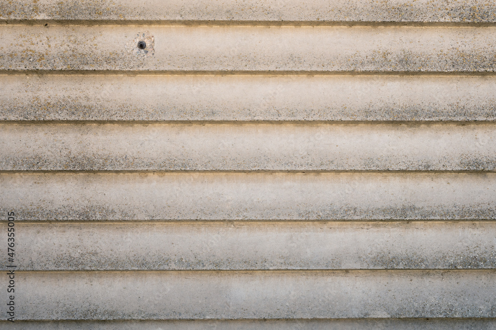 concrete slab with horizontal line pattern. photo background loft style