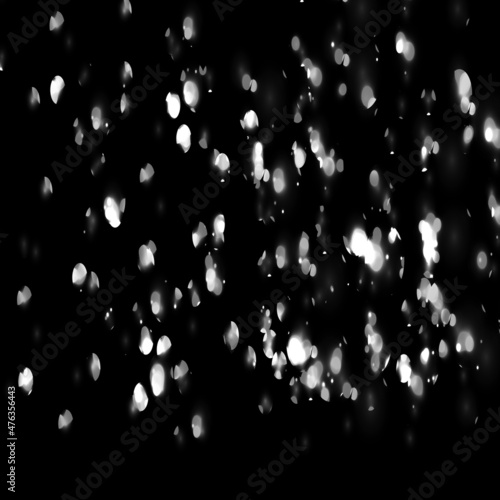 Fototapeta Naklejka Na Ścianę i Meble -  Flying dust particles on a black background