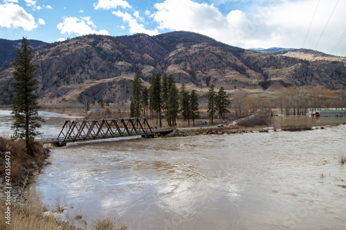 Similkameen Valley, BC, Canada on November 16, 2021 water rising over the banks and flooding the valley at Chopaka Rd photo