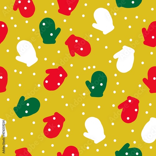 Simple winter pattern. Yellow background, cute colored mittens and snow. Fashionable print for postcards, banners and textiles.