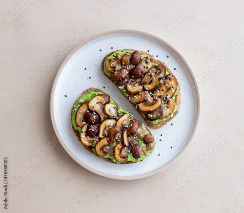 Bruschetta with mushrooms and avocados. Healthy eating. Vegetarian food. Keto diet.