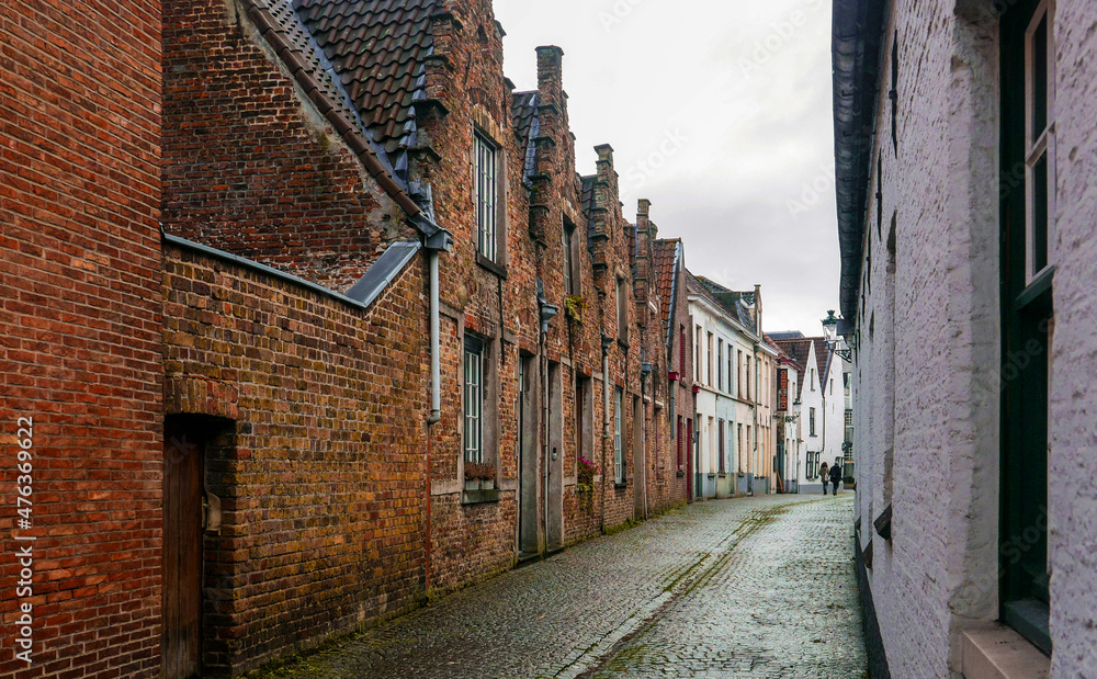 Fototapeta premium old brick historic residential houses in the Belgian city of Bruges 