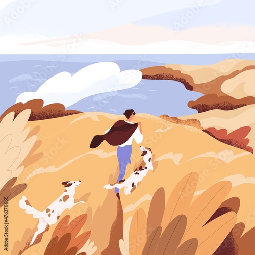 Autumn sea landscape with man walking with dogs. Happy person and pets stroll...