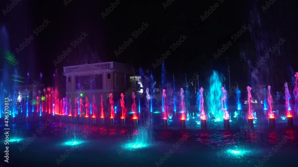 Light and music show of dancing fountain with illumination and lasers. Vigan city, Ilocos Sur, Philippines. Travel vacation concept. Light and music show of dancing fountain with illumination and lasers. Vigan city, Ilocos Sur, Philippines. Travel vacation concept.