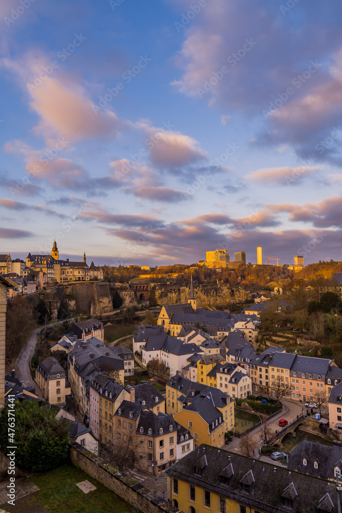 Vertical sunset view of the lower town of Luxembourg City with Kirchberg business district in the background