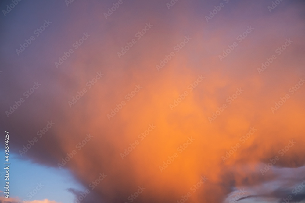 Amazing sunset sky with rich saturated natural warm and cool colors. Abstract background.