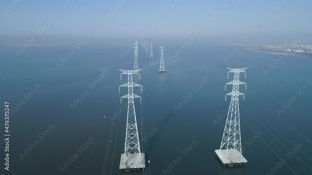 Aerial view of electric transmission tower above the sea, high voltage steel pylon, power, electric, energy, industry. 시화호, 철탑, 고압선, 송전탑.
Aerial view of electric transmission tower above the sea, high voltage steel pylon, power, electric, energy, industry. 시화호, 철탑, 고압선, 송전탑.
