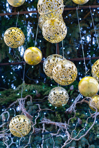 Christmas toys on spruce branches