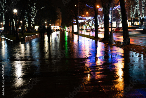 Night lights in the city after rain