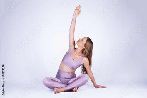 Beautiful pregnant woman practicing yoga