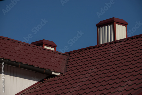 Roof metal sheets. Modern types of roofing materials © Oleh Marchak