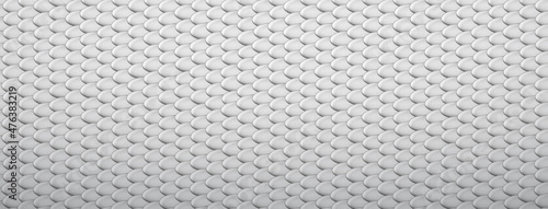 Abstract background of snake, dragon or fish scales in white and gray colors. Squama texture. Roof tiles.