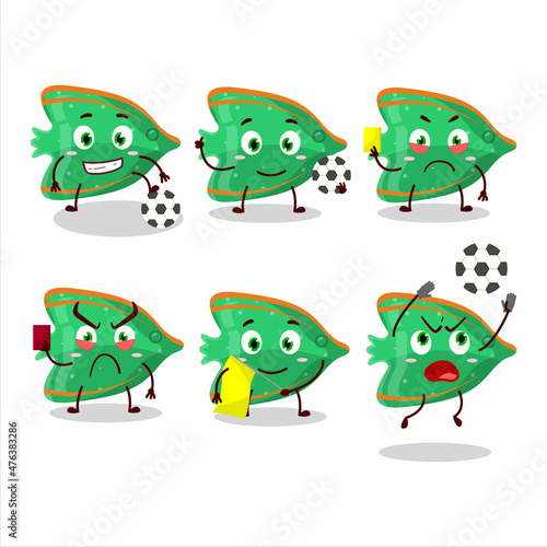 Fish green gummy candy cartoon character working as a Football referee