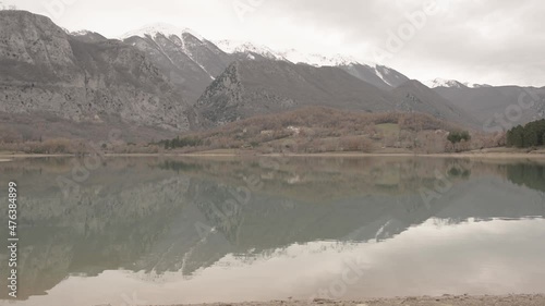 landscape with lake and mountains, Castel San Vincenzo, Molise Italy, slog video photo