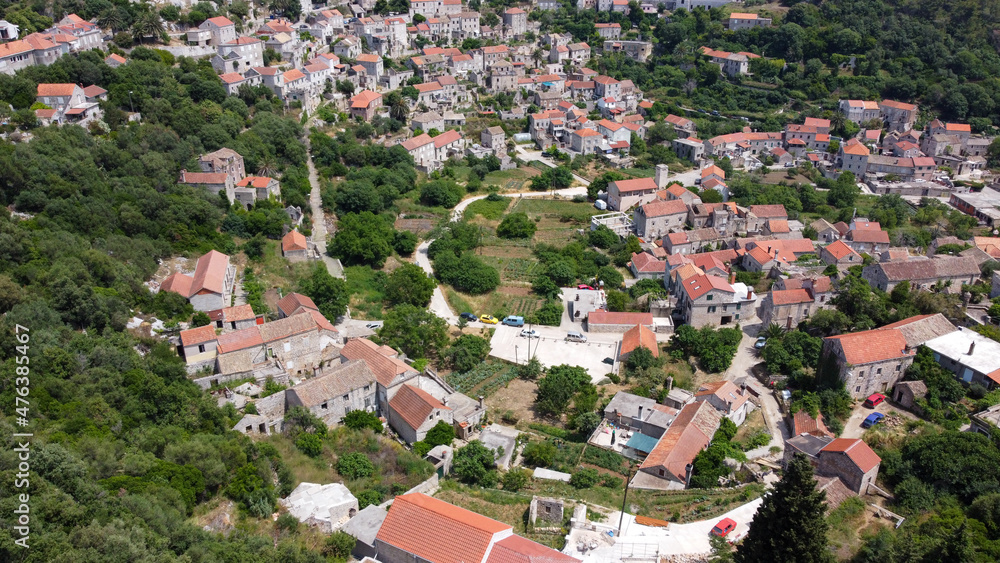 Obraz premium Lastovo otok island village, aerial photography of historic town within a Croatian national park, Croatia