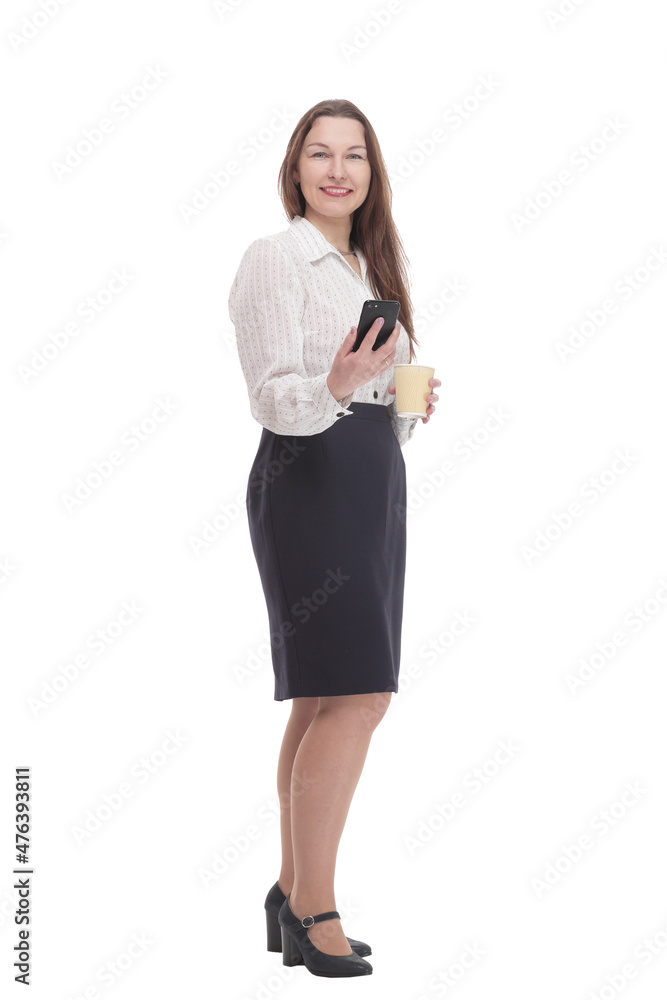 in full growth. smiling business woman with a smartphone . in full growth. smiling business woman with a smartphone .
