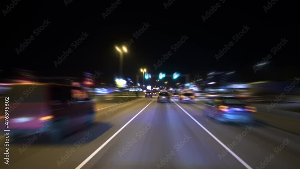 4K - Motion timelapse of driving a car in a big city at night 4K - Motion timelapse of driving a car in a big city at night