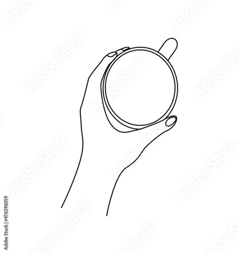 the girl's hand is holding a mug. View from above.  Linear style illustration