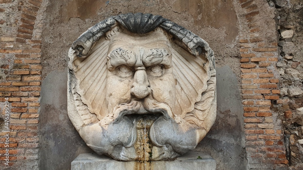 Decoration of the fountain in the form of a face