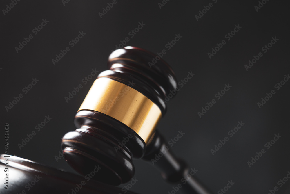 Law and justice. Wooden judge gavel, close-up view. Law and justice. Wooden judge gavel, close-up view.