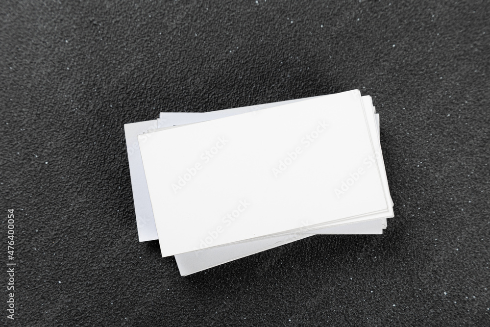 Photos of business cards. Mock-up for corporate identity on a black background. For graphic designers presentations and portfolios Photos of business cards. Mock-up for corporate identity on a black background. For graphic designers presentations and portfolios
