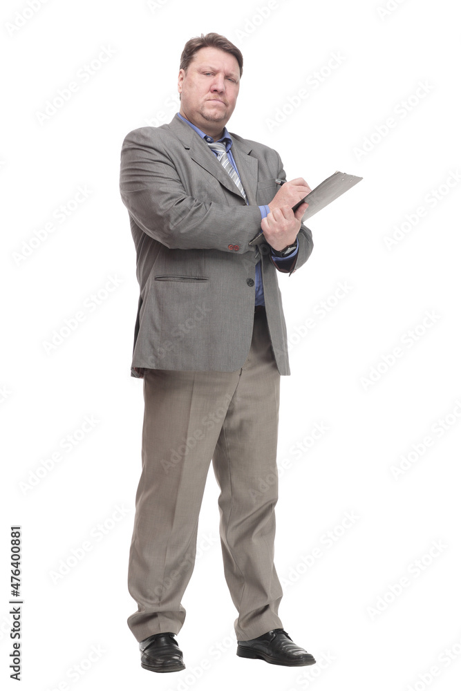 in full growth. serious business man with a clipboard. in full growth. serious business man with a clipboard.