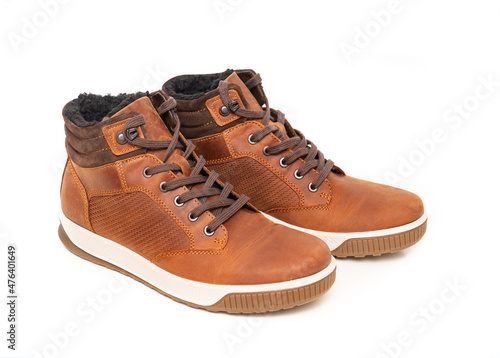 brown leather winter boots with lacing on a white background