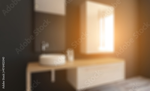 Spacious bathroom in gray tones with heated floors, freestanding. Abstract blur phototography.