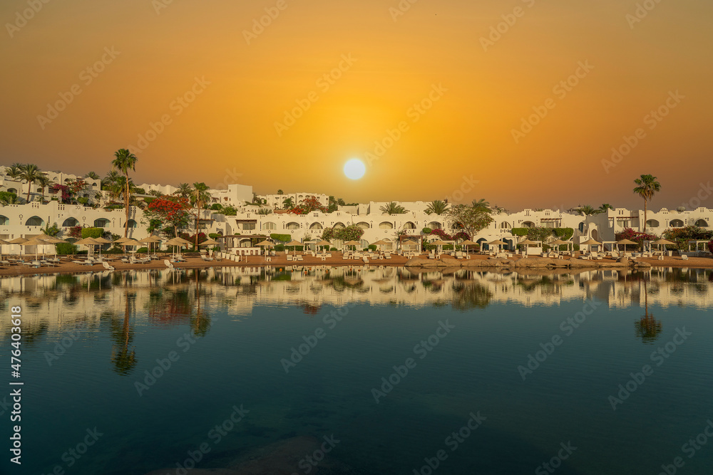 Calm beach on the red sea of Sharm El Sheikh during sunrise, Egypt