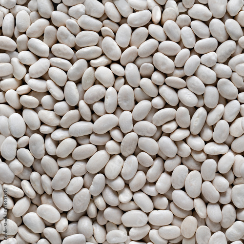 Seamless texture of background of white beans. Top view
