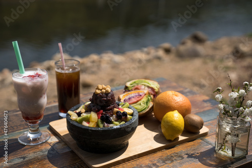 Summer drinks set outdoors, various fruits and traditional Korean desserts