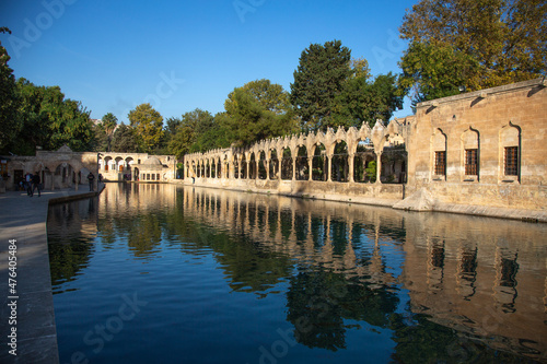 Man looking at water from mosque