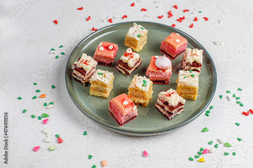 Delicious christmas dessert slices decorated with sprinkles.
