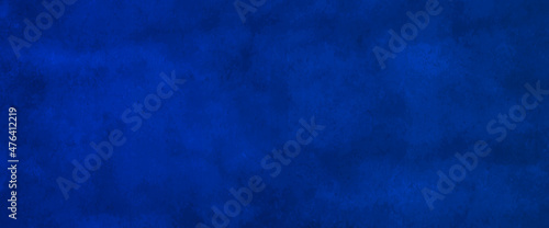 Indigo dark blue scraped wall abstract texture for background.