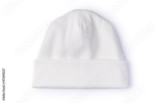 White beanie hat isolated on white background. Top view of trendy youth headwear