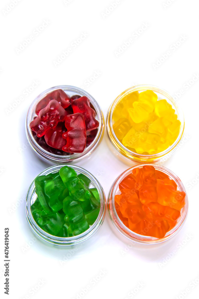 Jelly vitamins candy teddy bears isolate on a white background. Selective focus. Jelly vitamins candy teddy bears isolate on a white background. Selective focus.