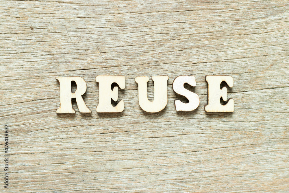 Alphabet letter in word reuse on wood background Alphabet letter in word reuse on wood background