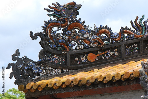Colorful imperial city gate. This is lead into the forbidden city where the feudal king work Imperial Royal was in the 19th century in Hue, Vietnam