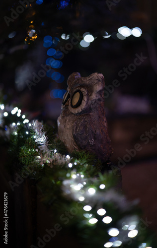 Owl as decoration with Christmas lighting.