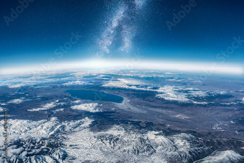 View of stars and milkyway above Earth from space. Beautiful space view of the Earth with cloud formation