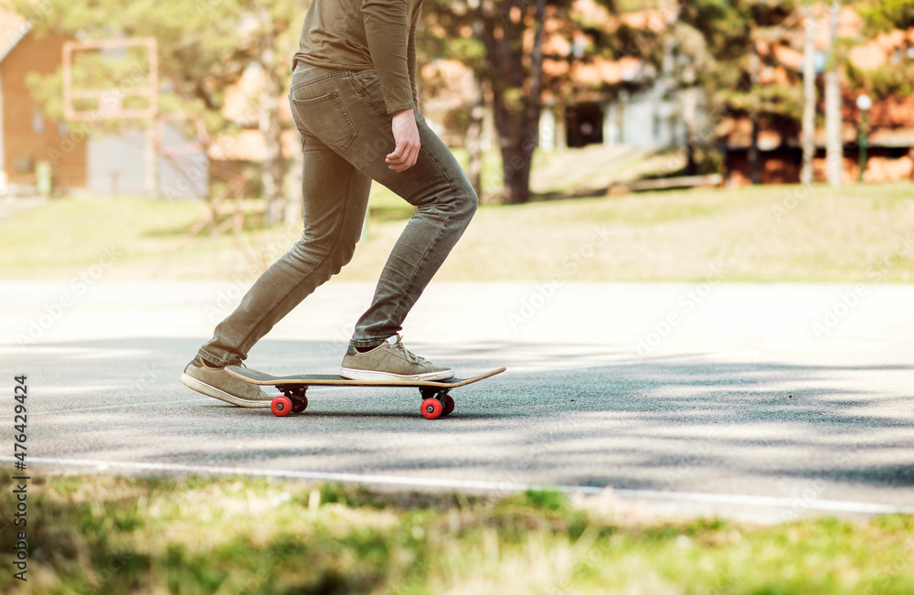man in park on skateboard