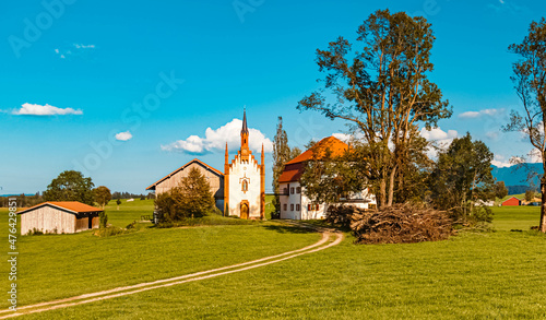 Beautiful summer view at Saint Ulrich, former summer residence of the bishops of Augsburg, Rosshaupten, Bavaria, Germany photo