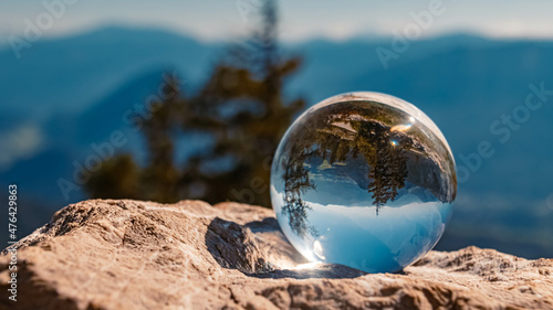 Crystal ball alpine summer landscape shot at the famous Loser summit near Altaussee, Steiermark, Austria © Martin Erdniss