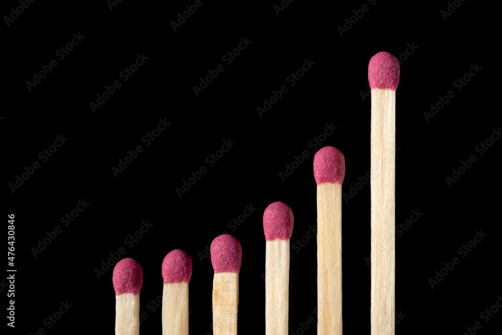 Uprise graph made of matches. Concept of positive statistics, chart, growth Uprise graph made of matches. Concept of positive statistics, chart, growth